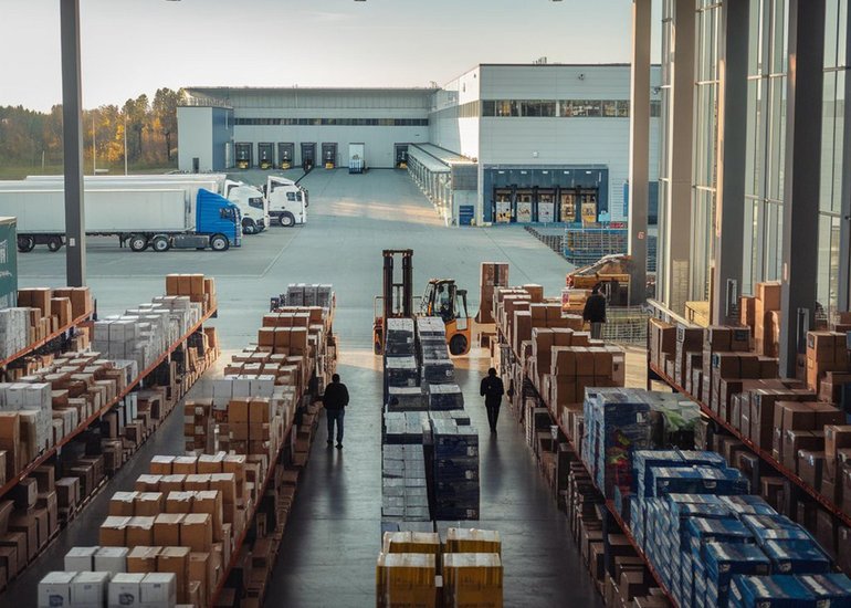 retail-warehouse-full-shelves-with-goods-cartonslogistics-transportation-blurred-background